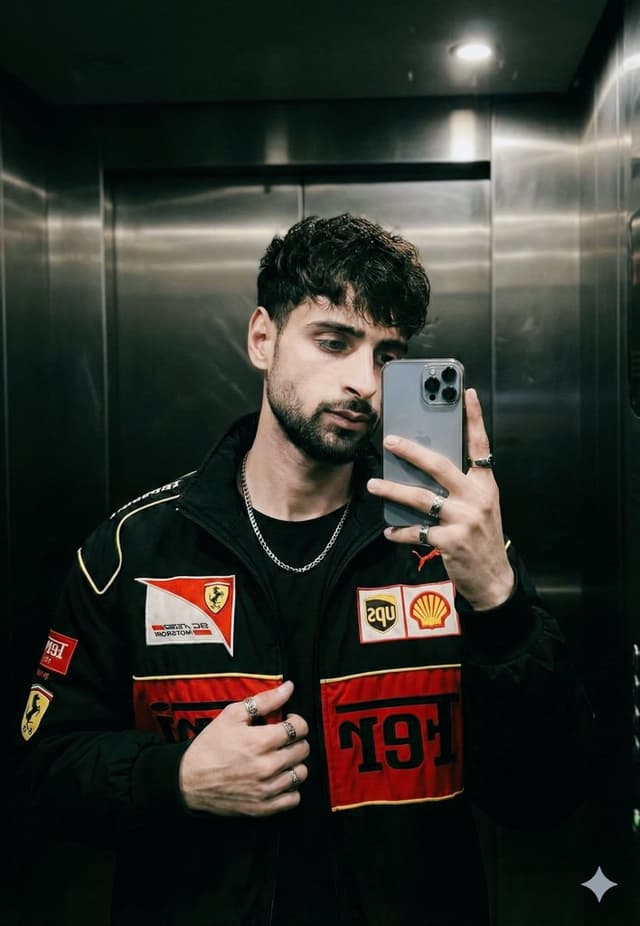 Cinematic mirror selfie in a stainless-steel elevator — output