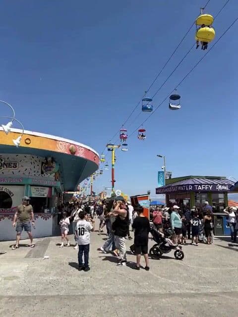 Giant cartoon girl vlog at an amusement park — cover