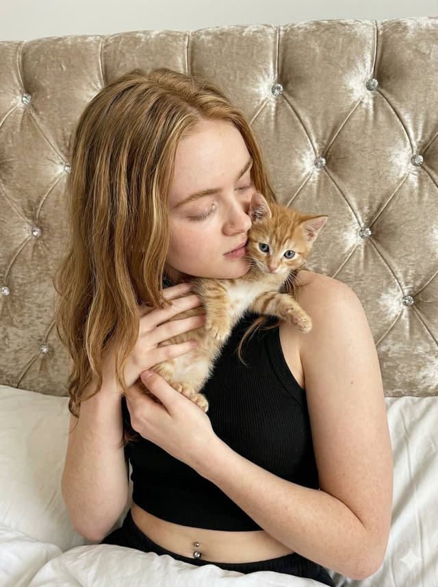 Tender Portrait of Woman Nuzzling a Kitten — output