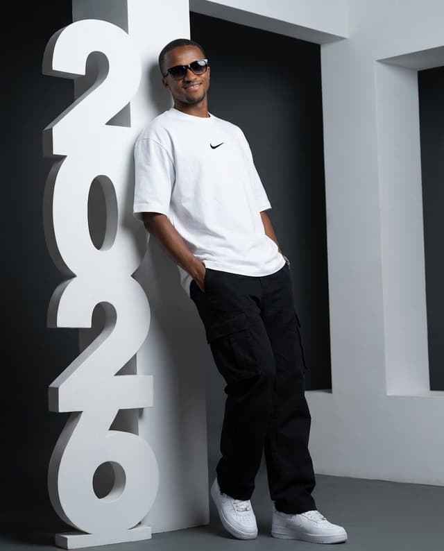 Product Marketing - Low-Angle Streetwear Portrait with Architectural Text — output