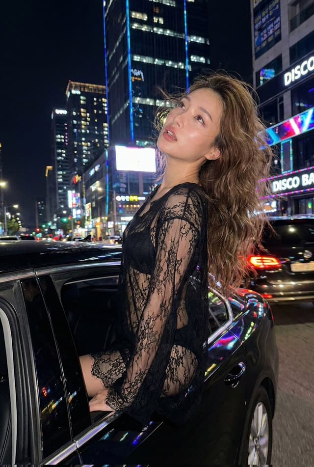Product Marketing - Nighttime Urban Fashion Editorial in Luxury Sedan Prompt — output