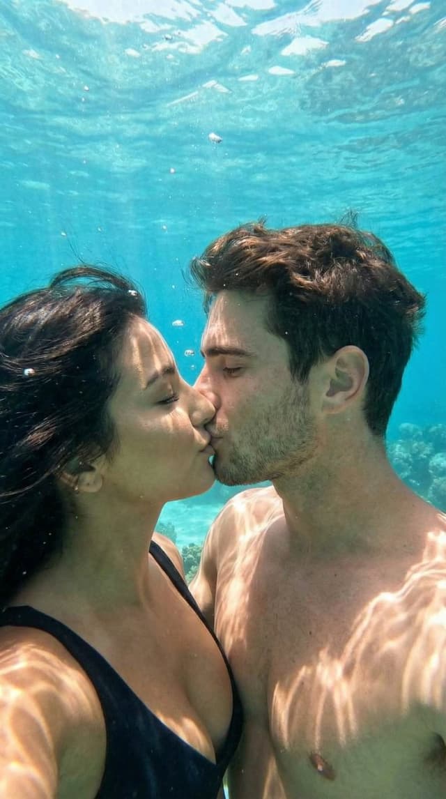 Social Media Post - Underwater Cinematic Couple Kiss with Identity Preservation — output