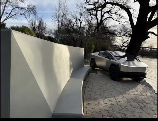 Cybertruck Driving Near Bench — cover