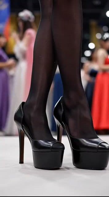 Video generation prompt for a cosplay model's foot and leg focus — cover