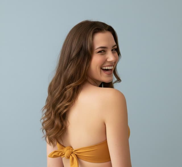 Playful Overhead Bikini Portrait Prompt — output