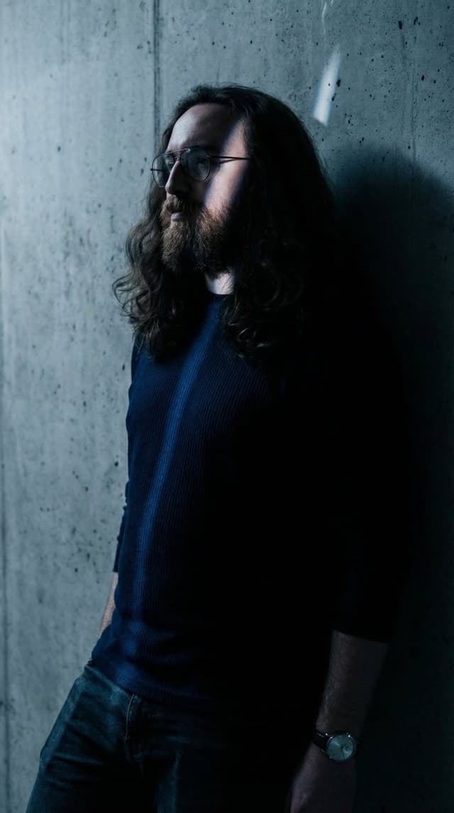 Moody High-Contrast Portrait with Rim Light — output