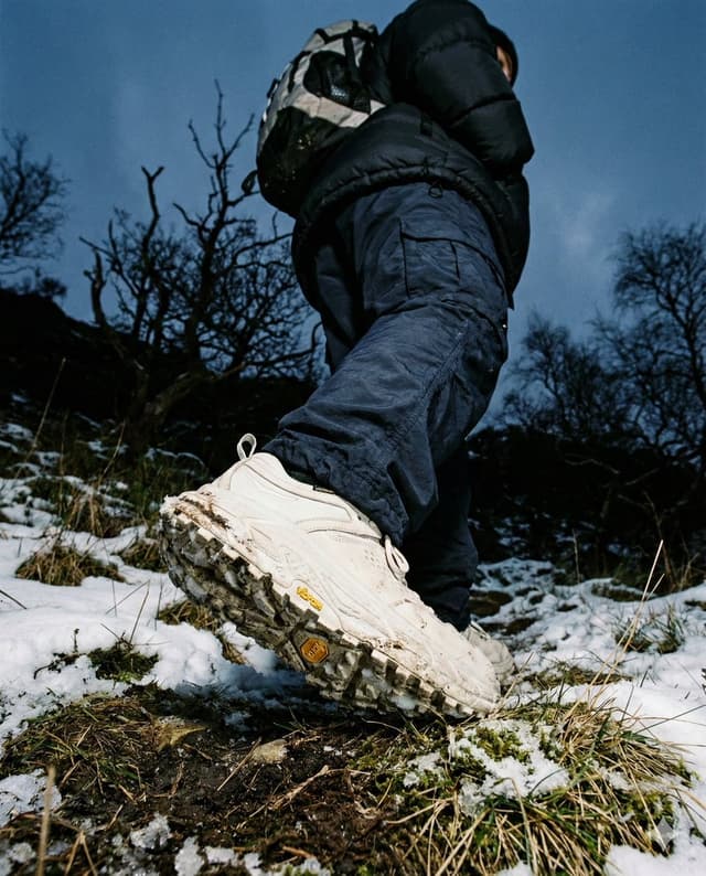 E-commerce Main Image - Gorpcore Editorial: Extreme Worm's-Eye View of Hiking Boot — output