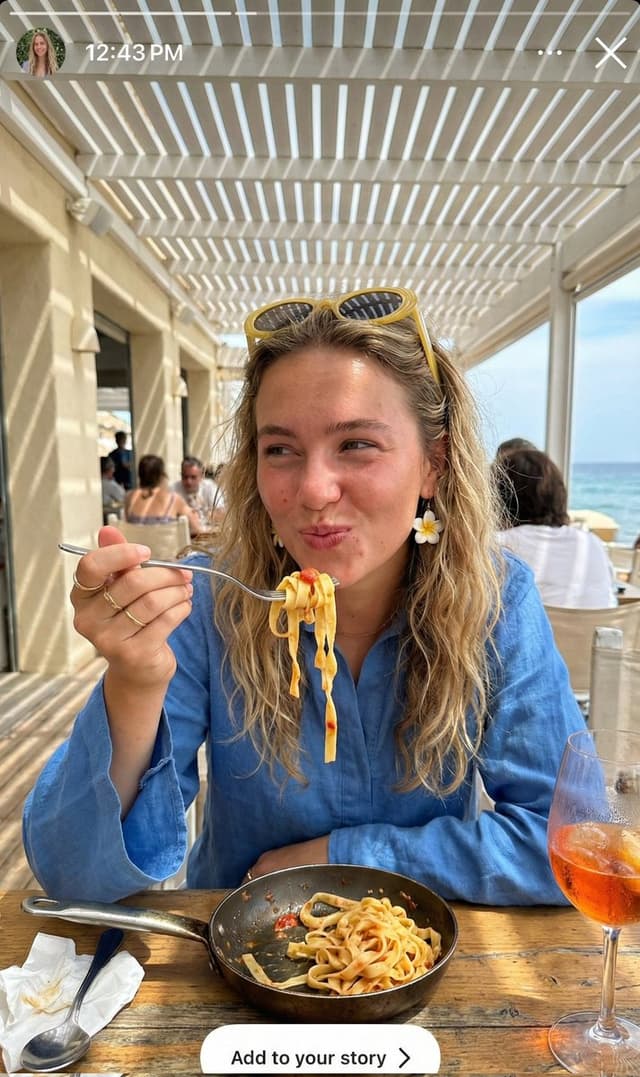 Ultra-Realistic Candid Instagram Story Photo of Woman Eating Pasta — output