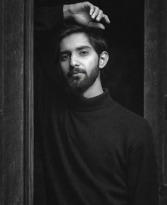 Black and White Fine-Art Portrait Prompt with Cinematic Contrast — output
